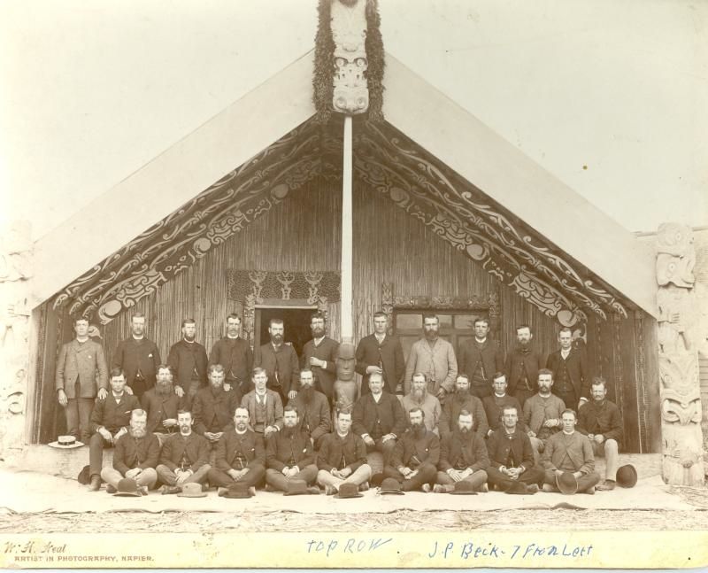 New Zealand Missionaries, Australasian Mission, in front of Maori whare